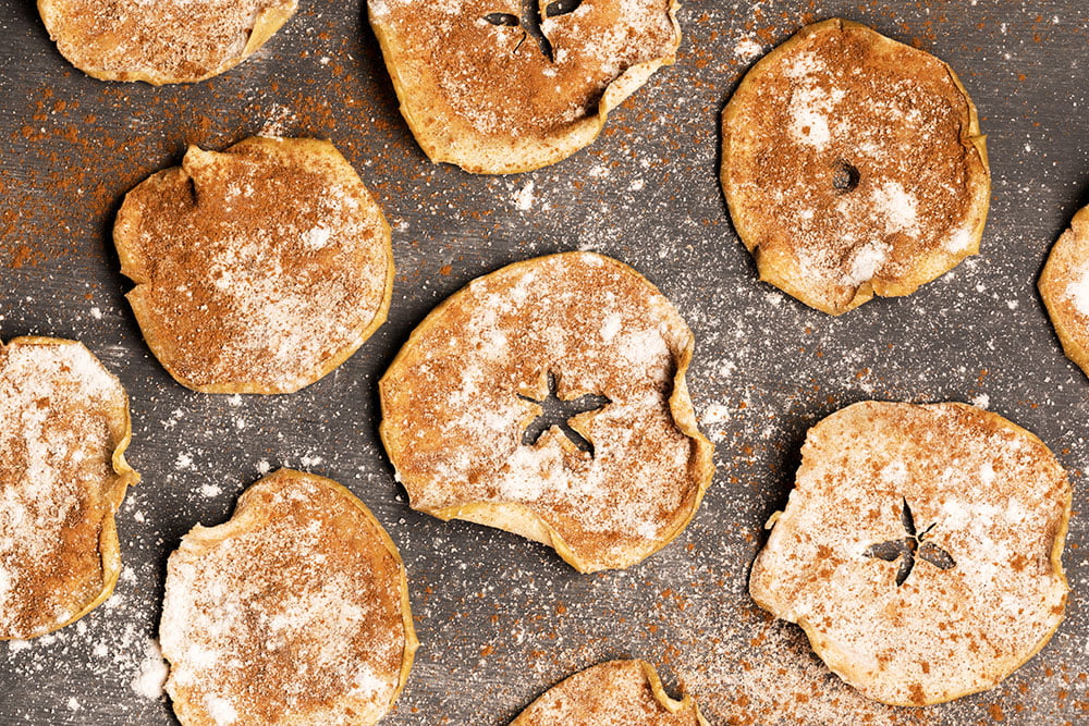 Sprinkle cinnamon on to your apple rings.