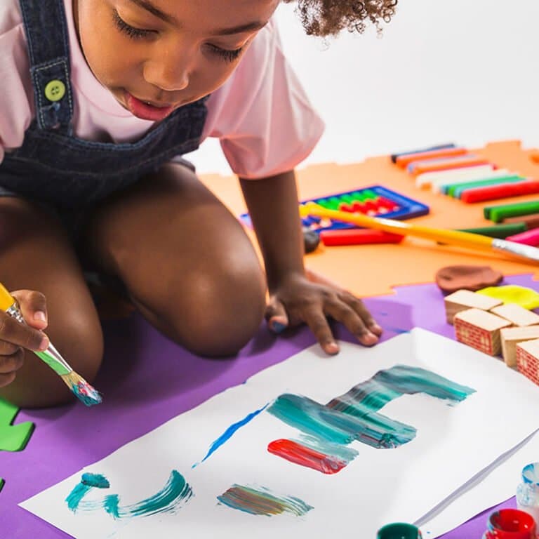 Turn toddler scribbles into fine art with this easy canvas and stencil DIY
