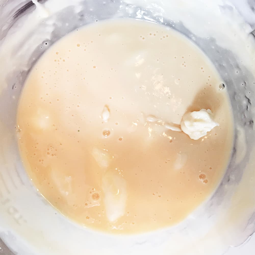 Melted goats milk soap base showing the process of how to make honey goats milk soap
