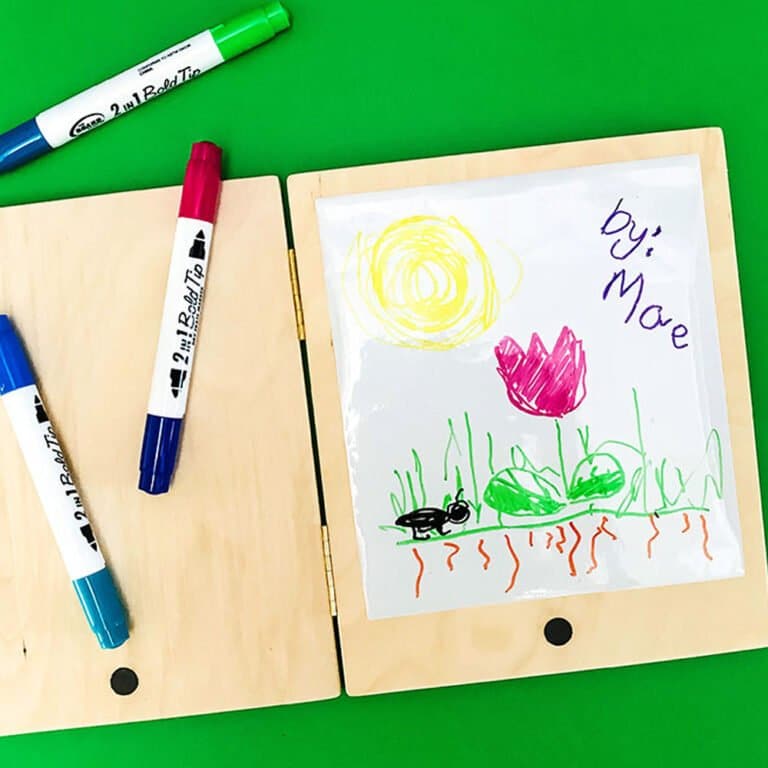 This simple DIY tablet toy lets kids enjoy creative tech play without the screen time, and can be made into a play laptop with our free printables! | via barley and birch