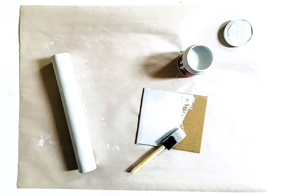 Paint the cardboard tubes for the Montessori walk-around-the-sun candle base.