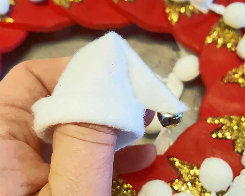 Make a simple winter hat for each fox out of felt.