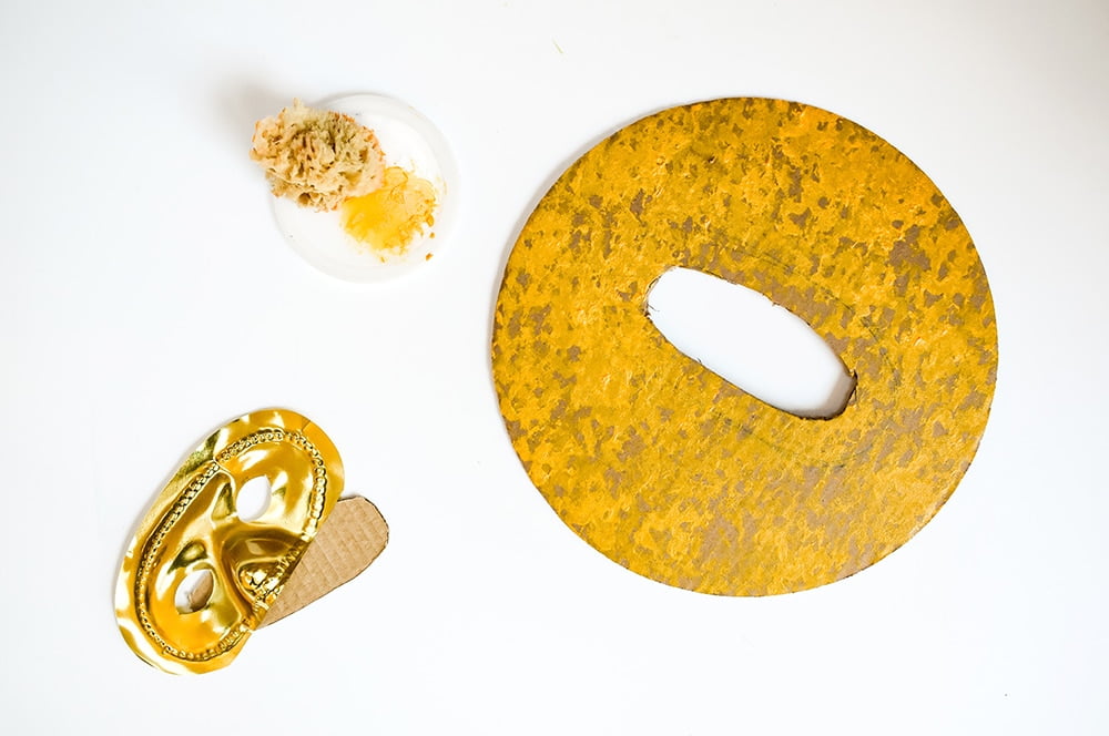 Make a lion mask fit for a king with simple supplies! A most regal DIY no-sew costume for kids.
