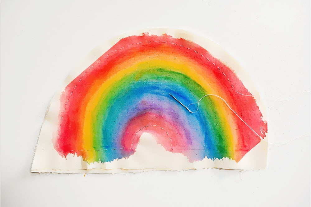 A beautiful and easy mini rainbow pillow kids can make on their own using chalk pastels.