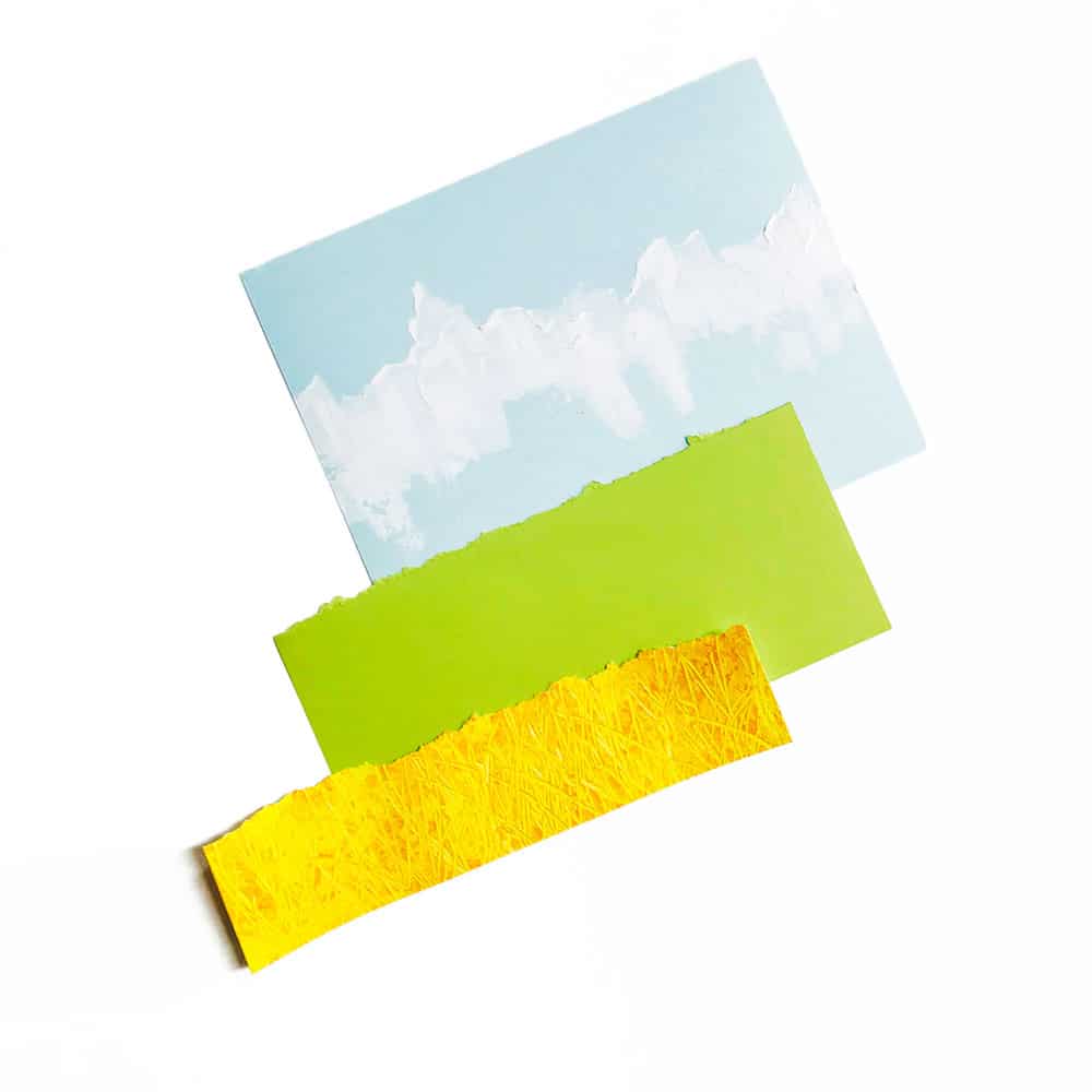 Add layers of torn paper with different painted textures to create your Great Plains landscape background.
