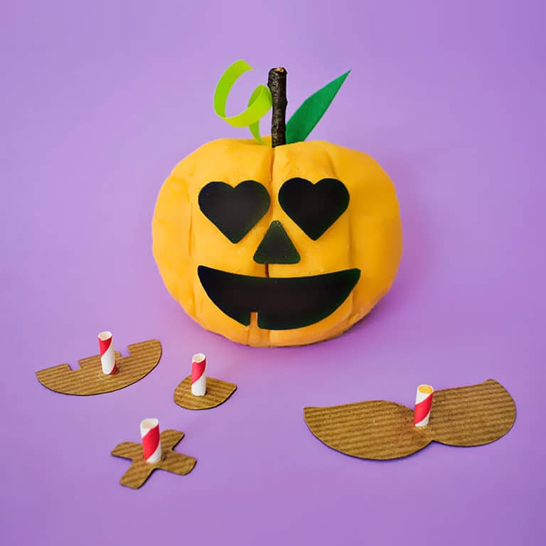Celebrate Halloween with this fun build-your-own Jack-O-Lantern play dough activity for kids!