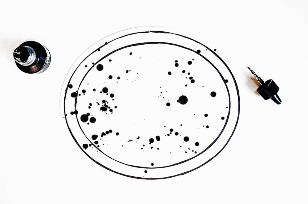 Splatter ink to give your frame a spooky look! | DIY faux bat collection for kids