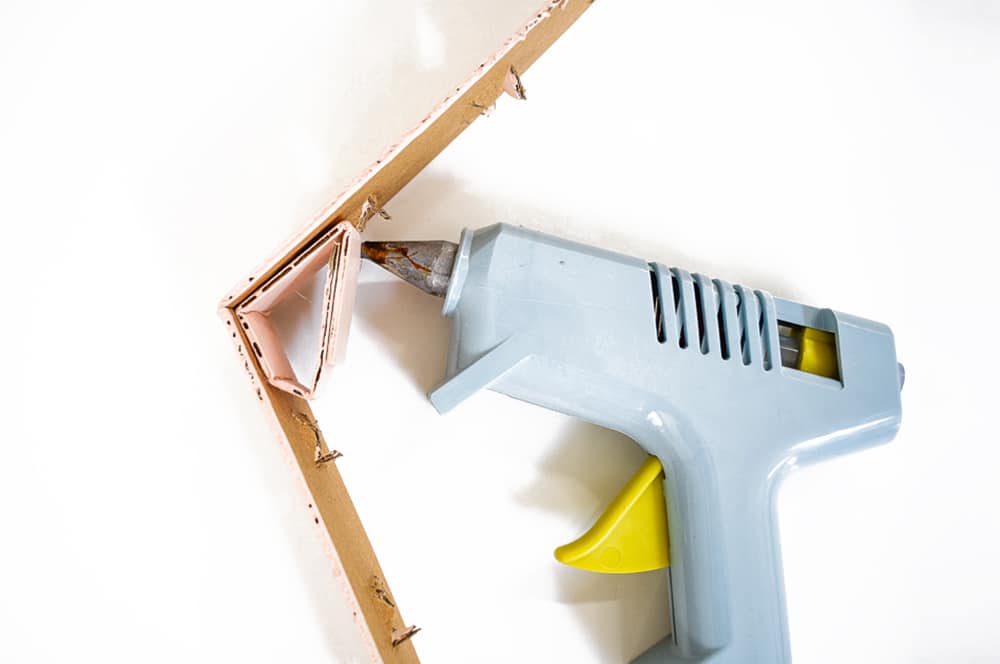 Glue small cardboard support to base | Instructions for a DIY Twig Menorah