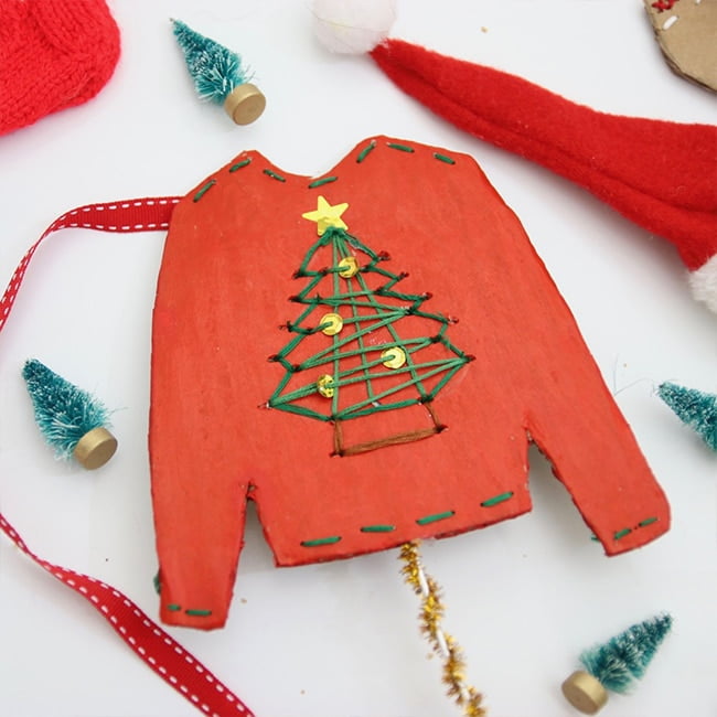 Kids holiday crafts from everyday supplies - cardboard Christmas jumper sewing cards | via barley & birch