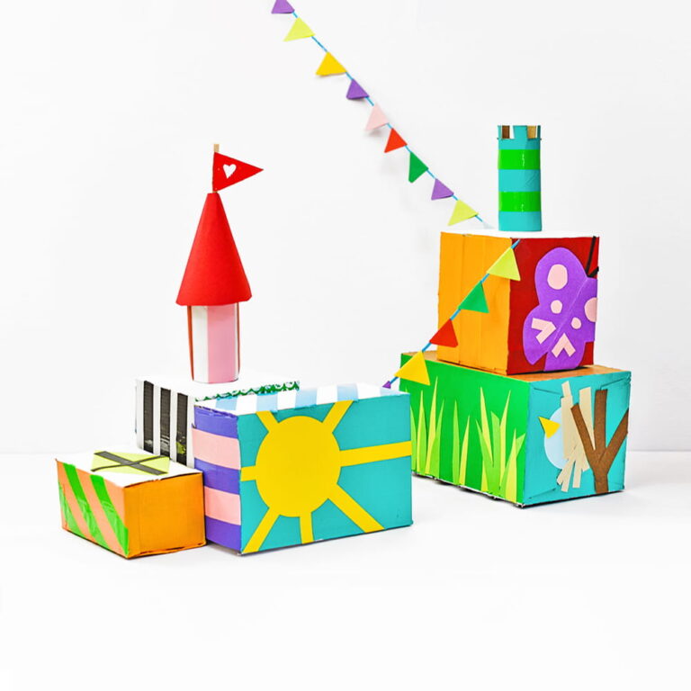 One of the kids play castle arrangements made with our DIY cardboard building blocks