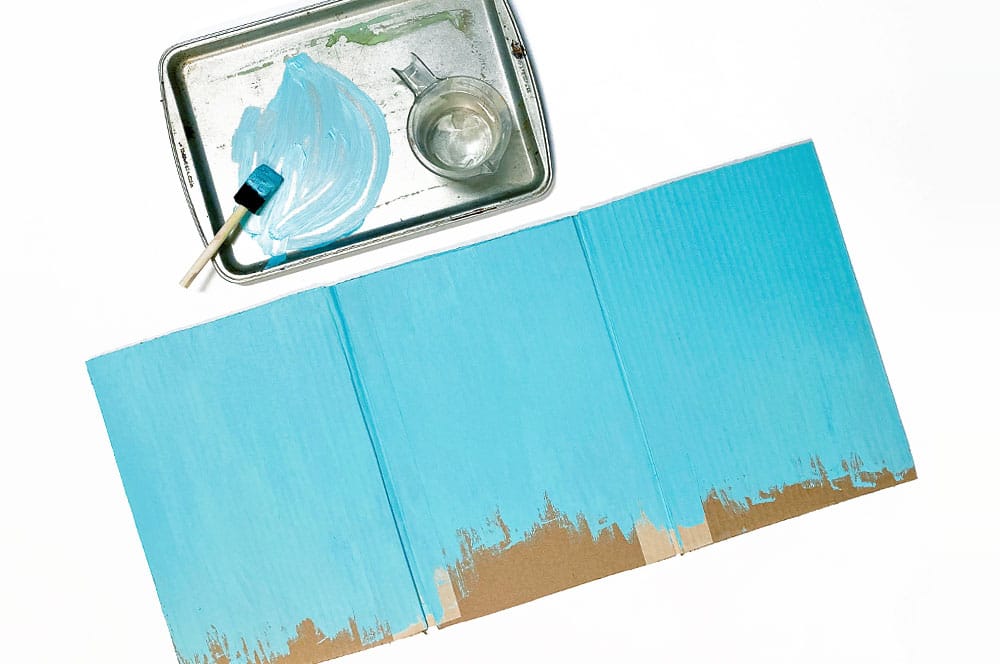 Paint the cardboard pages for your city landscape book | via barley & birch