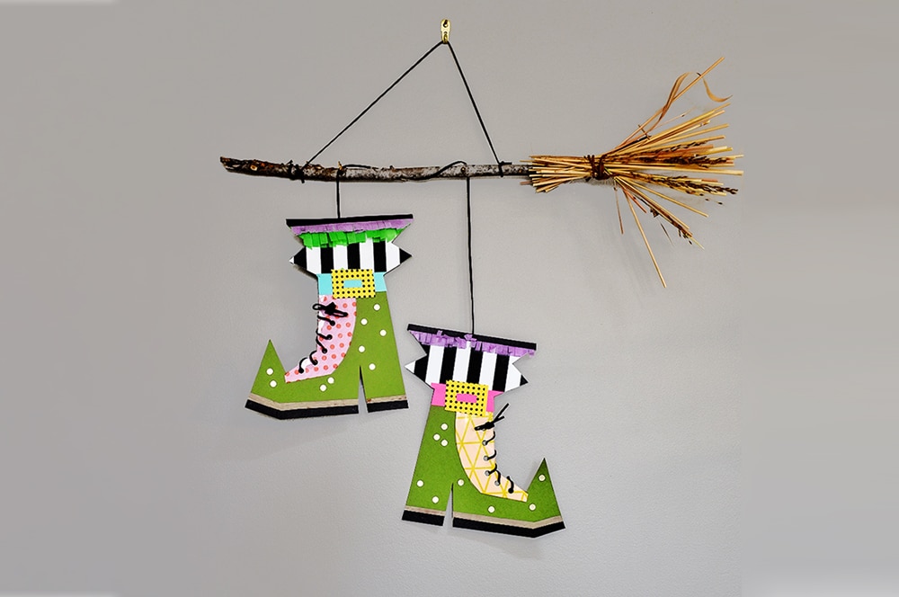 Hang your witch's broom and loop your boots around the broomstick! | via barley & birch