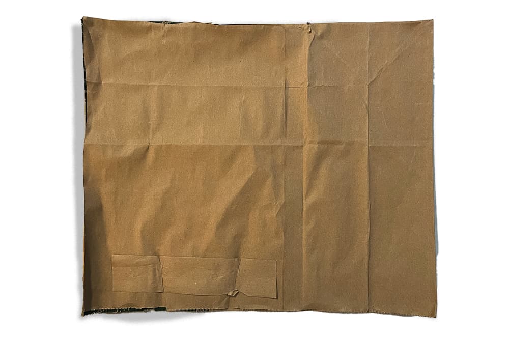 The process of making a paper bag bear den craft for kids
