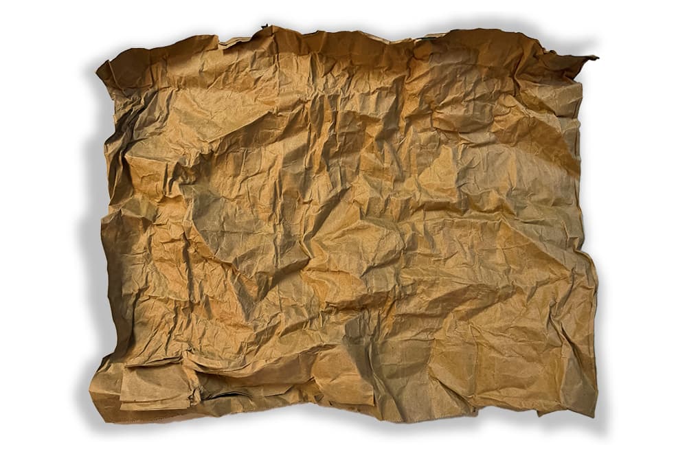 The process of making a paper bag bear den craft for kids
