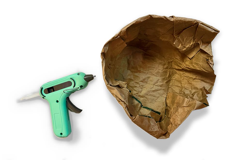 The process of making a paper bag bear den craft for kids
