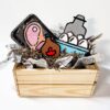 A crate of DIY cardboard farmers market food for preschool pretend play