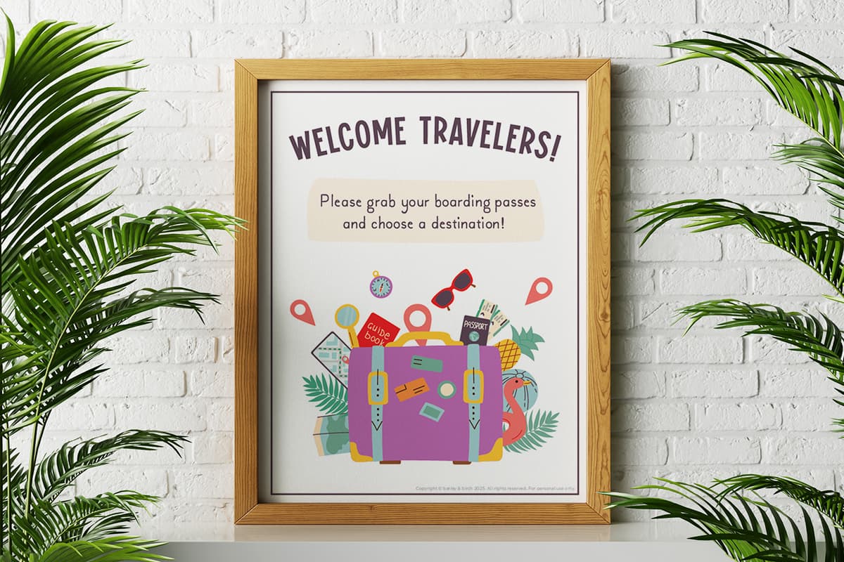 A framed printable virtual trip poster for kids sitting between two palms against a white brick wall.