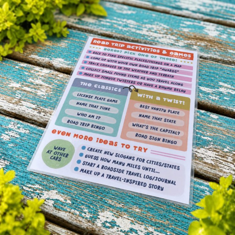2 sheets of our no-prep kids boredom buster printable PDF set sitting on an aqua background with foliage
