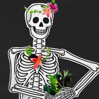 paper-skeleton-craft-ideas A life-sized paper skeleton decorated with paper accessories sitting on a black background